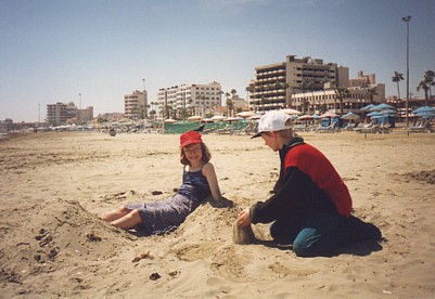 Building on Larnaka beach with a friend